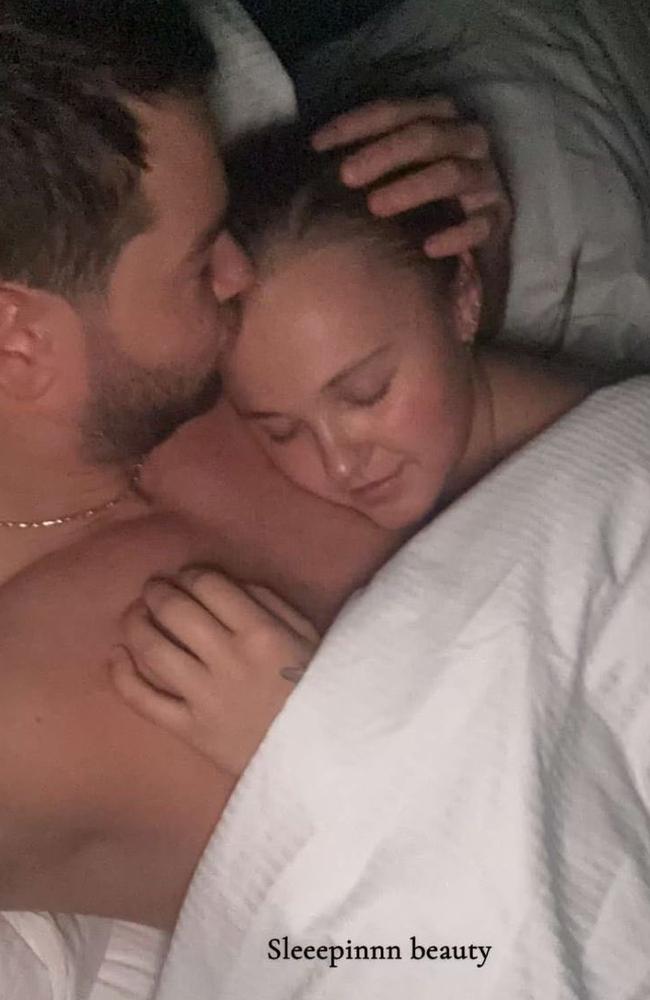 Chris Hughes shared this intimate sleeping photo of JoJo Siwa cuddling in bed together on his Snapchat account.