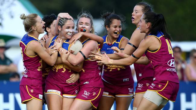 Brisbane players celebrate after a goal. Picture: Liam Kidston