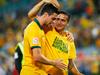 SYDNEY, AUSTRALIA - JANUARY 13: Tomi Juric of Australia is congratulated by teammate Tim Cahill after the 2015 Asian Cup match between Oman and Australia at ANZ Stadium on January 13, 2015 in Sydney, Australia. (Photo by Daniel Munoz/Getty Images)