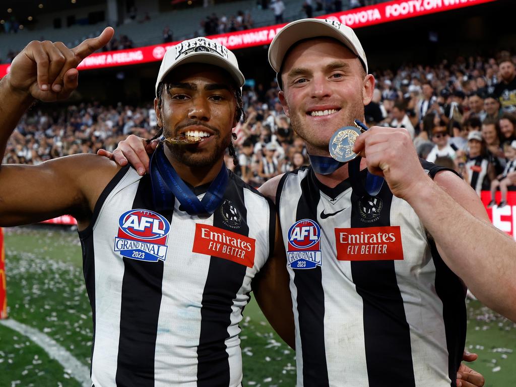 Tom Mitchell with Isaac Quaynor after Collingwood’s Grand Final victory. Picture: Michael Willson/AFL Photos via Getty Images