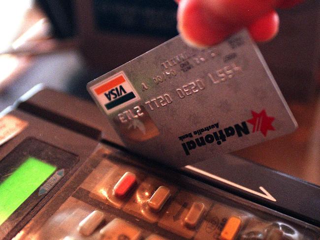 Generic photo of National Bank Visa credit card being used in Eftpos machine 02 Mar 1999.   /NSW   archived