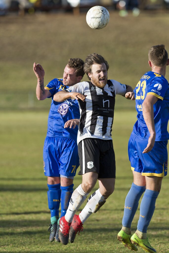 Ashley Freier (left) of USQ FC and Zach Taylor of Willowburn in Toowoomba Football League Premier Men semi-final at Commonwealth Oval, Sunday, August 26, 2018. Picture: Kevin Farmer