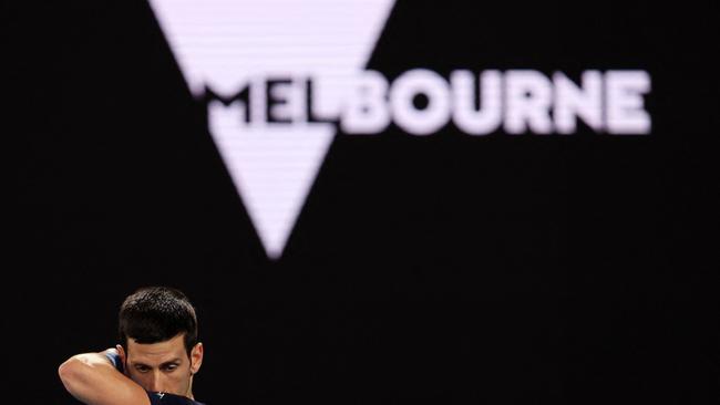 Novak Djokovic attends a practice session in Melbourne after briefly being allowed out of detention.