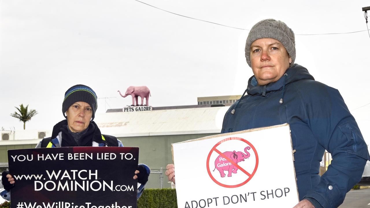 Mo Orr (left) and Carly Middap stood on Ruthven Street raising awareness of the ill treatment of the pets sold by Pets Galore.