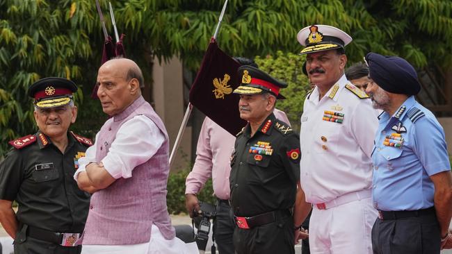 Indian Defence Minister Rajnath Singh, second left, with Indian defence chiefs. Picture: AP