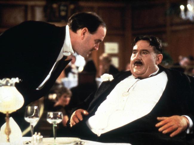 MONTY PYTHON'S THE MEANING OF LIFE (BR1983) JOHN CLEESE AND TERRY JONES AS MR CREOSOTE     Date: 1983