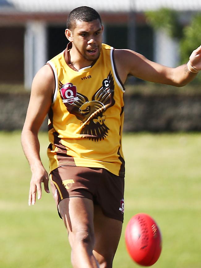 Hawks' Ezekiel Frank kicks down the field in the AFL Cairns match between the Manunda Hawks and the Centrals Trinity Beach Bulldogs, held at Cazalys Stadium, Westcourt. PICTURE: BRENDAN RADKE