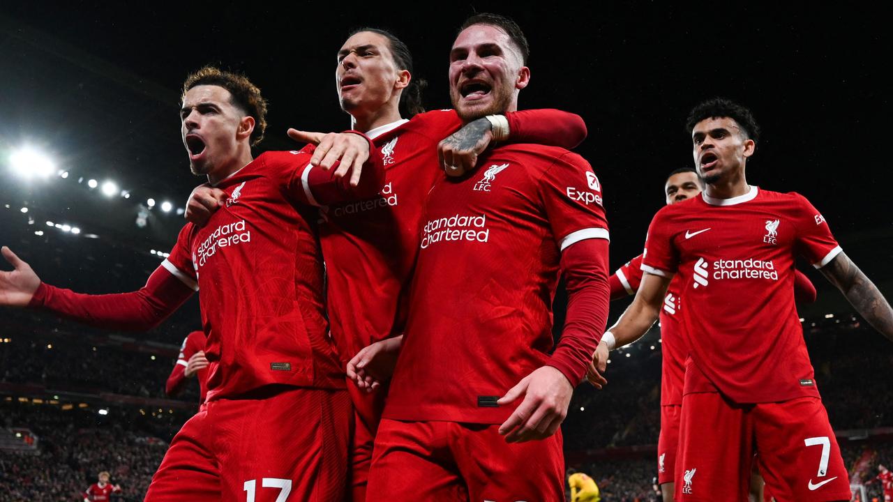 Liverpool celebrate after Alexis Mac Allister’s stunning strike against Sheffield United. (Photo by Paul ELLIS / AFP)