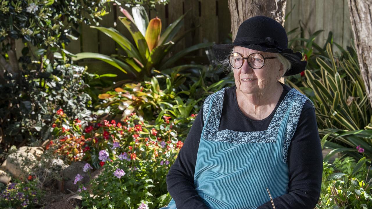 Martha Collier relaxes in her Chronicle Garden Competition entered garden. Picture: Nev Madsen.