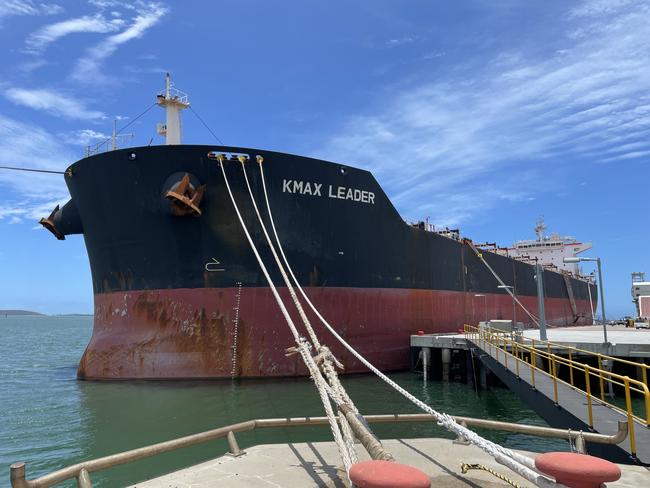 A foreign-owned bulk carrier that posed a risk of damaging the Great Barrier Reef and other vessels in a Queensland port was towed out of Australian waters and has now been slapped a massive fine.