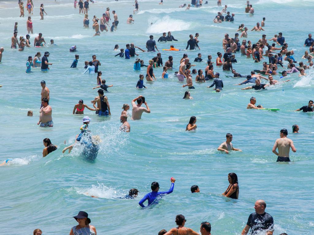 Huge crowds at Noosa on New Year’s Day. Picture Lachie Millard