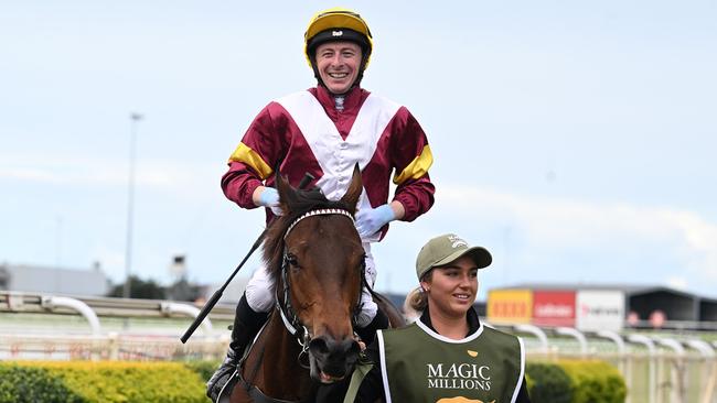 Winners are grinners … Harry Coffey comes back to scale after winning at Doomben aboard Arabian Summer. Picture: Grant Peters / Trackside Photography