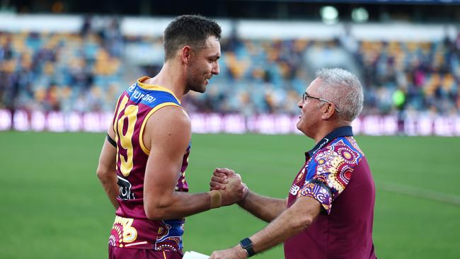 Jack Gunston, seen here with Lions coach Chris Fagan, wants to return to Hawthorn after just one season in Brisbane. (Photo by Chris Hyde/Getty Images)