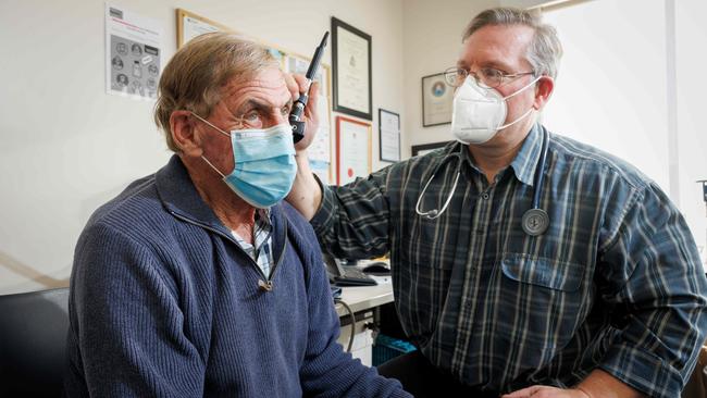 Doctor Jason Lemon with pensioner Darrel Doyle, who must pay out-of-pocket cost of $20.25 per visit. Picture: Peter Mathew