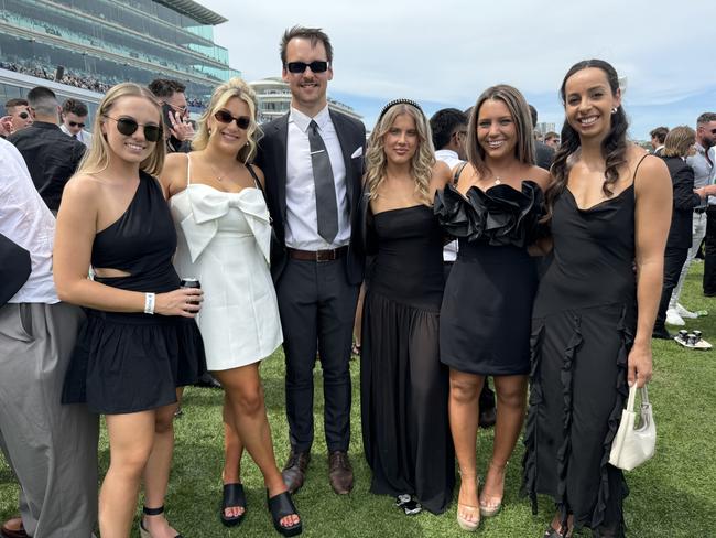 Alysha Kovacs, Kate Brien, Lachie VOlk, Olivia Sleeman, Amelia Humphreys and Nicole Chrysicos at Flemington for Derby Day on November 2, 2024. Picture: Phillippa Butt