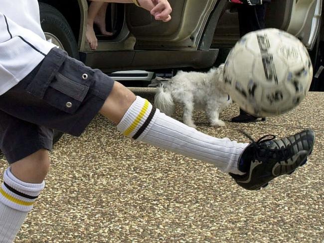 APRIL 11, 2003: Generic photo of Blake Spriggs (11) getting some last minute practice in with his soccer ball before mum Leanda takes him & sister Dimitee (8) off to attend their weekend sports, 11/04/03. Pic Waide Maguire. People / Family