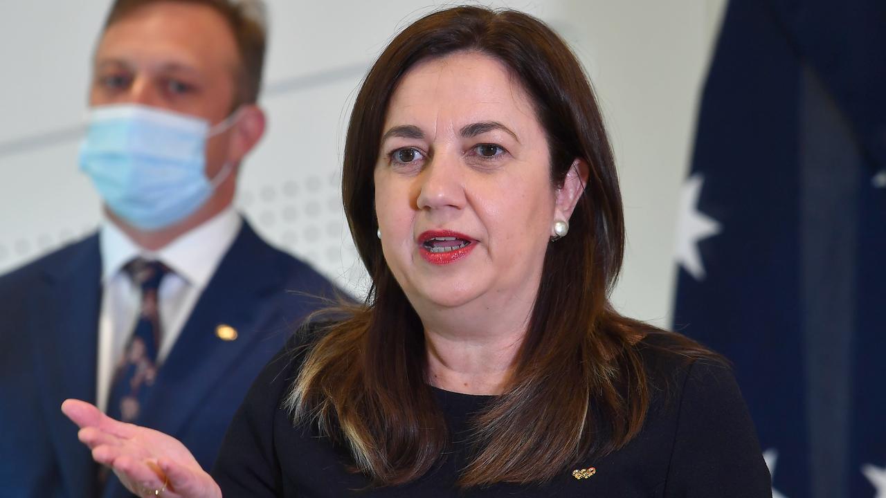 Premier Annastacia Palaszczuk provides a Covid update with Deputy Premier Steven Miles at back. Picture: NCA NewsWire / John Gass