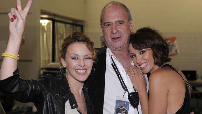 Kylie Minogue backstage with Dannii Minogue and Michael Gudinski in 2009. Picture: Martin Philbey/Redferns