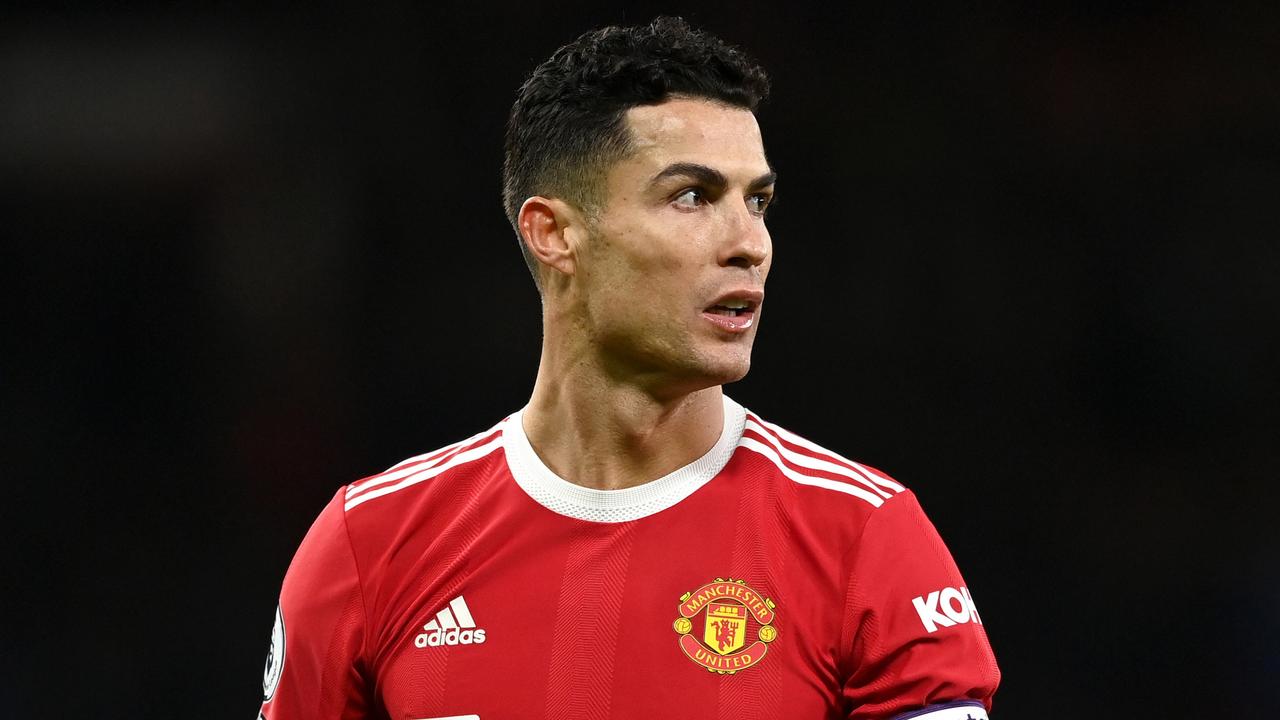 MANCHESTER, ENGLAND - JANUARY 03: Cristiano Ronaldo of Manchester United reacts wearing the captains armband during the Premier League match between Manchester United and Wolverhampton Wanderers at Old Trafford on January 03, 2022 in Manchester, England. (Photo by Gareth Copley/Getty Images)