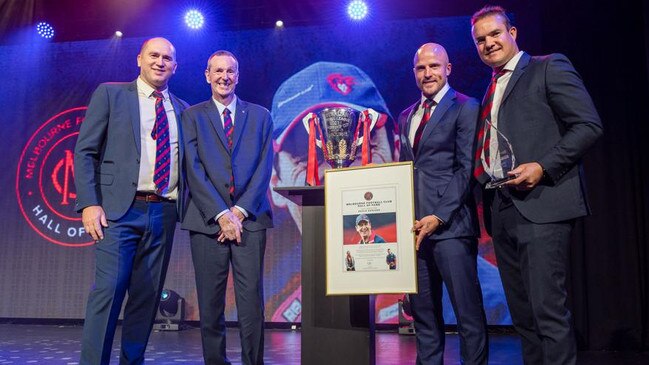 Neale Daniher with Melbourne legends Nathan Jones, David Neitz and Brad Green. Picture: Andrew Hobbs