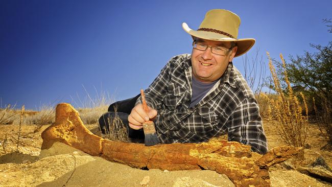 NT Museums Senior Curator of Earth Sciences, Adam Yates happily brushes sand from a recently exposed 8 Million Year Old Meg Fauna, Big Bird Bone.