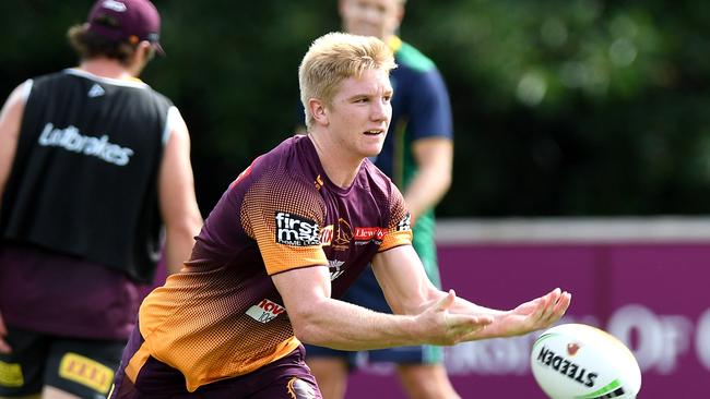 BRISBANE, AUSTRALIA - APRIL 30: Tom Dearden passes the ball during a Brisbane Broncos NRL training session at Red Hill on April 30, 2019 in Brisbane, Australia. (Photo by Bradley Kanaris/Getty Images)