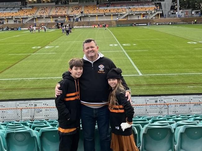 Australian ex-pat Matthew Leyshon with his children Reece and Charlotte.