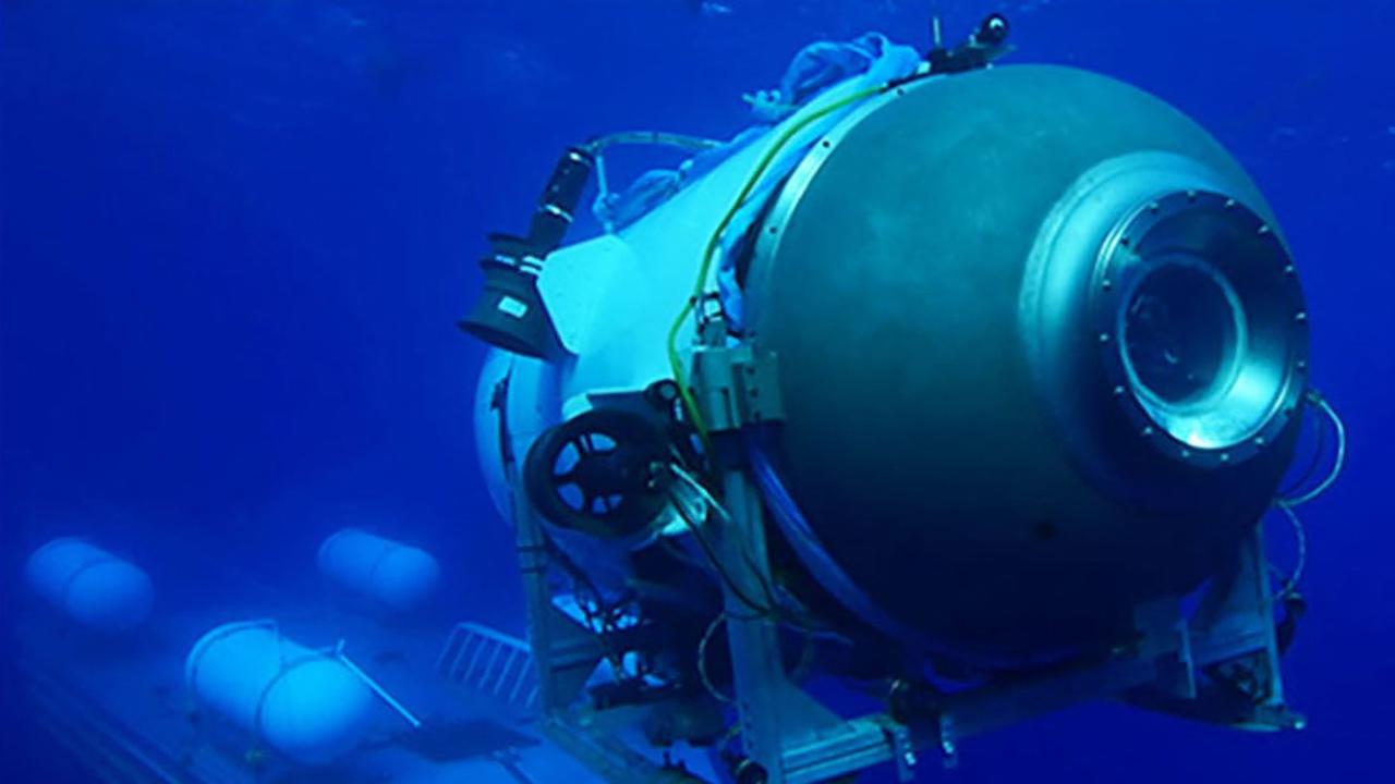This undated image courtesy of OceanGate Expeditions, shows their Titan submersible launching from a platform. Picture: Handout / OceanGate Expeditions / AFP