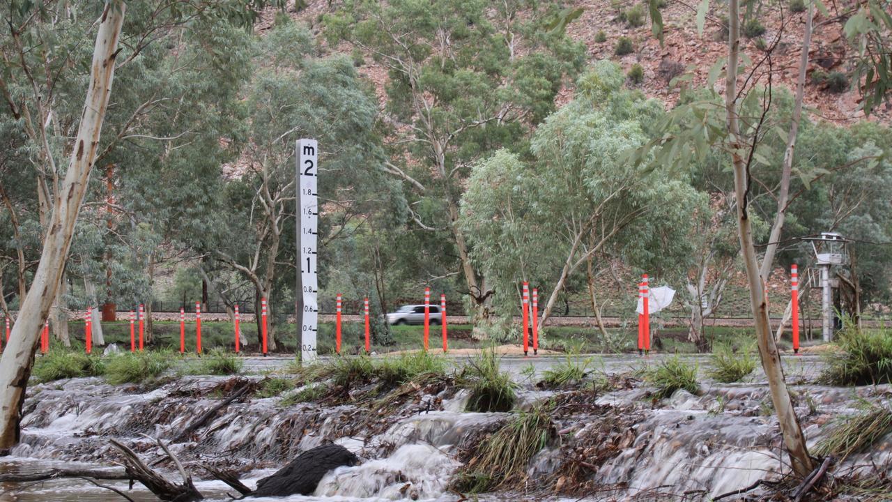 The Ross Highway Todd River crossing near Heavitree Gap, Alice Springs, April 2, 2025. Recent rain in Alice Springs triggered a flood alert warning residents the Todd river was running. Picture: Gera Kazakov
