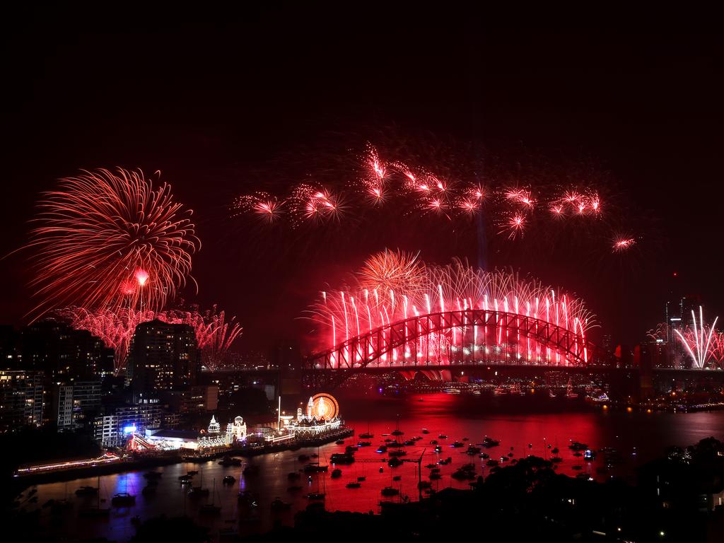 Fireworks light up the sky above Sydney Harbour during the midnight fireworks display during New Year's Eve celebrations on January 1st, 2020 in Sydney, Australia. (Photo by Cameron Spencer/Getty Images)