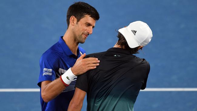 Serbia's Novak Djokovic shakes hand with France's Lucas Pouille. Picture: AFP