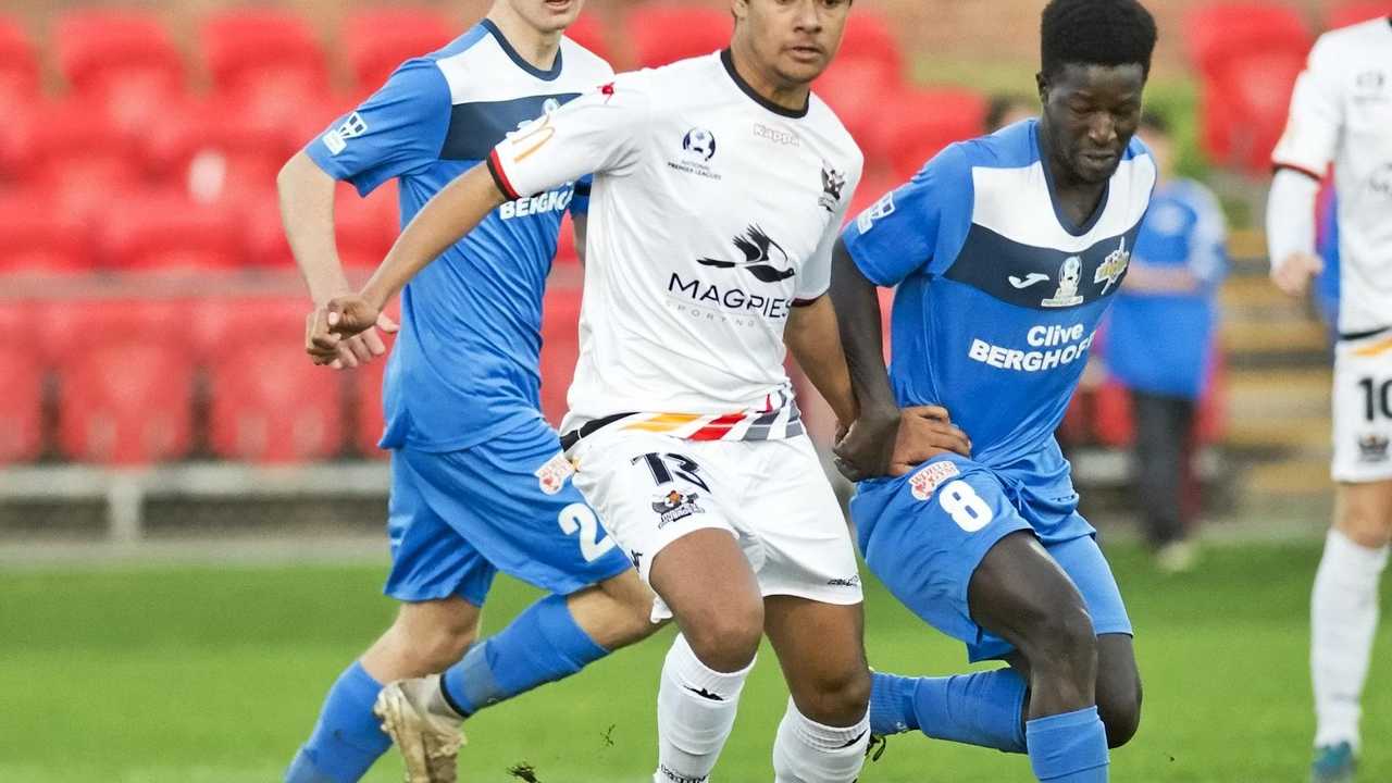 UNDER PRESSURE: SWQ Thunder midfielder Emmanuel Philip (right) attempts to win the ball of Magpies Crusaders opponent Makhaya Quakawoot. Picture: Nev Madsen