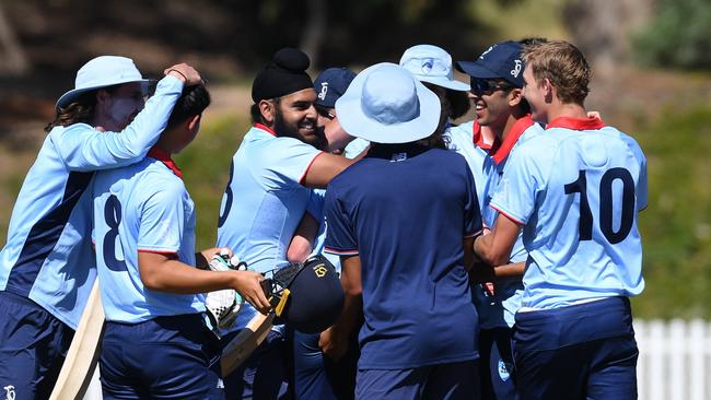 NSW Metro players celebrate after winning the grand final at Karen Rolton Oval 22 December, 2022, Cricket Australia U19 Male National Championships 2022-23.Picture: Cricket Australia.