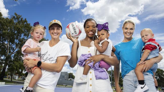 Queensland Firebirds juggling motherhood with their professional sporting careers Kim Ravaillion with Georgie, Eboni Usoro-Brown with Savannah, and Gretel Bueta with Bobbie. Picture Lachie Millard