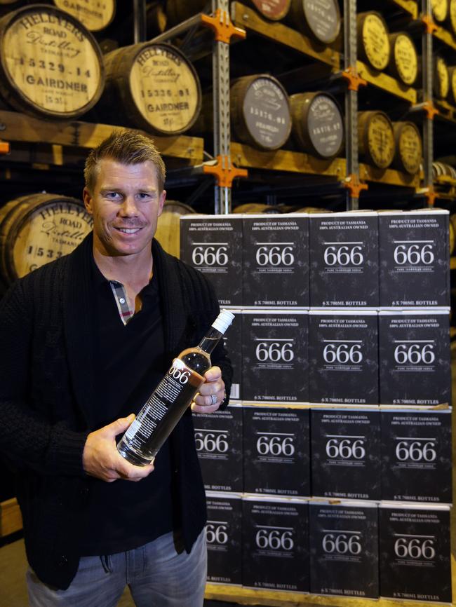 Cricketer David Warner joins Tasmania’s distilling boom, buying shares in the 666 Vodka company that is being produced by Hellyers Road Distillery. David Warner is pictured here during a tour of the factory ahead of the Hobart Test.