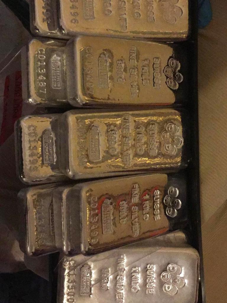 Among the items allegedly seized were silver bullion bars and cash. Picture: NSW Police