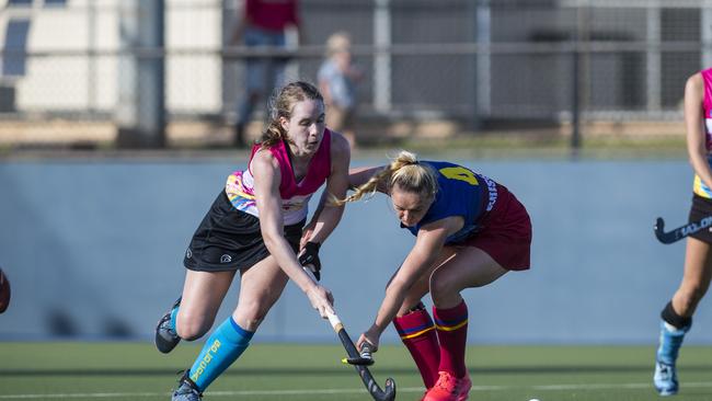 Gold Coast player Natarlia Smith (left) and Monique Brummer. Picture: Kevin Farmer