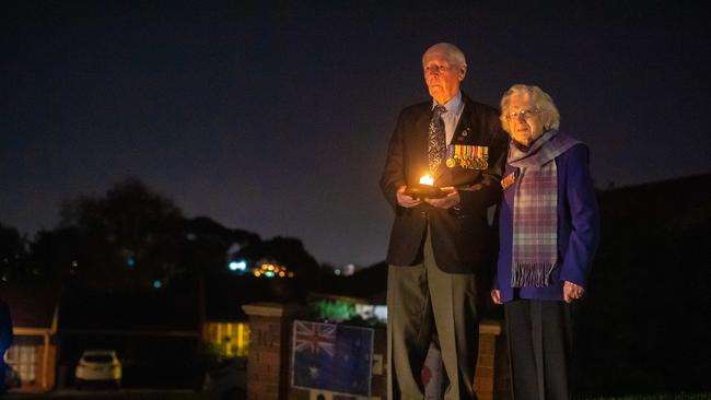 A 96 year old WWII veteran Wally McGillivray and wife Lorna, 92 at the end of their driveway. Picture: Jason Edwards