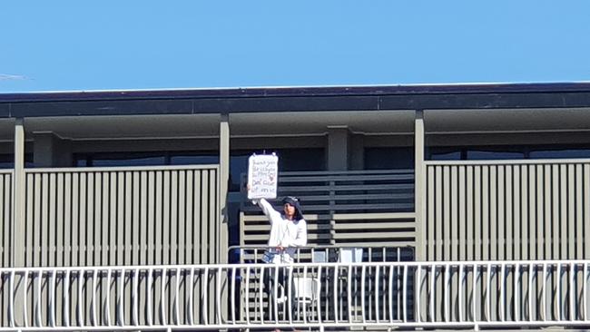 Activists protest outside a Kangaroo Point hotel in Brisbane. Picture: Nathan Edwards