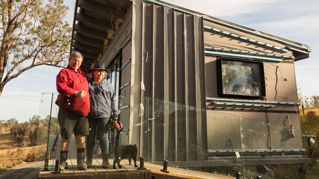 Graeme and Robyn Freedman are still living in a demountable studio more than three-years after fires devastated their property. Picture: Ben Marden