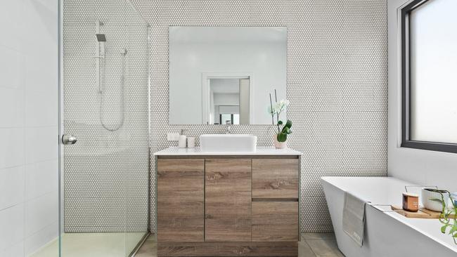 Decorative finishes create a lavish bathroom.