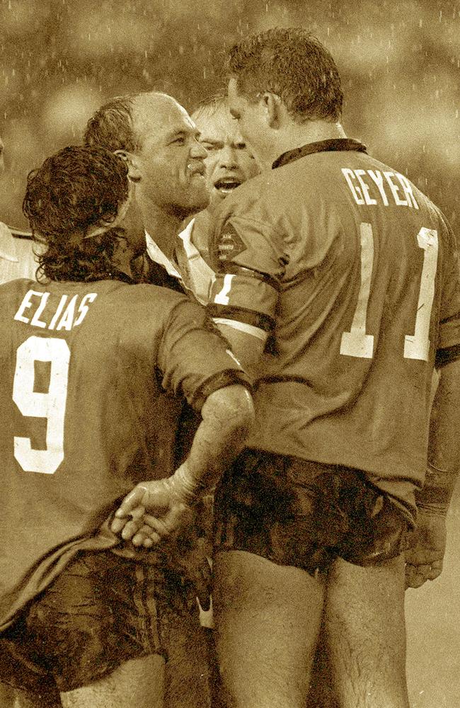 Wally Lewis and Blues' Mark Geyer square up during Origin