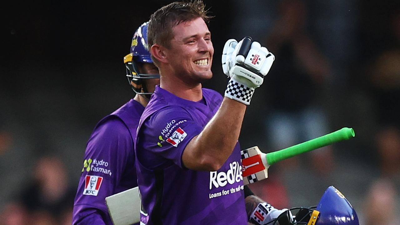 MELBOURNE, AUSTRALIA - DECEMBER 29: Ben McDermott of the Hurricanes celebrates after scoring a century during the Men's Big Bash League match between the Melbourne Renegades and the Hobart Hurricanes at Marvel Stadium, on December 29, 2021, in Melbourne, Australia. (Photo by Mike Owen/Getty Images)