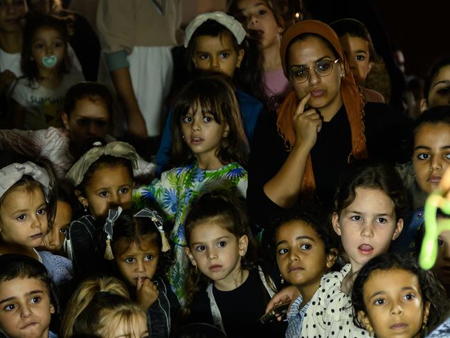 Young children react as they watch a puppet show telling the Talmudic story of Rabbi Avika, at Klil Malhchut Hall in Bnai Brak, Israel. Picture: Getty Images