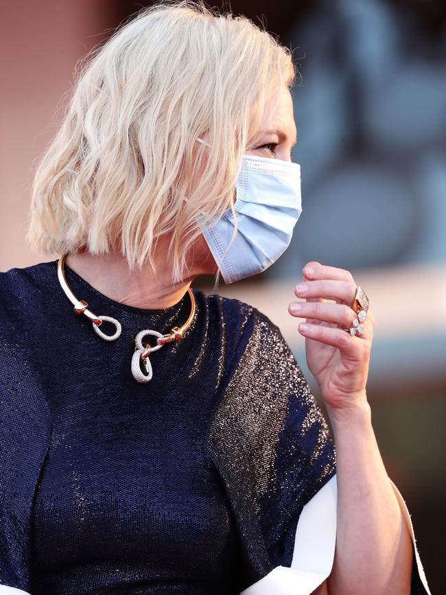 A masked Cate Blanchett gets ready to walk the red carpet at the 77th Venice Film Festival. Picture: Getty Images