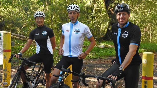 SADDLING UP: Noosa bike enthusiasts filming an uphill ride through Tinbeerwah Forest. Picture: Peter Gardiner