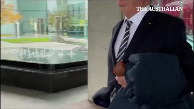 Wild footage emerges of Peter Costello knocking journalist to the ground