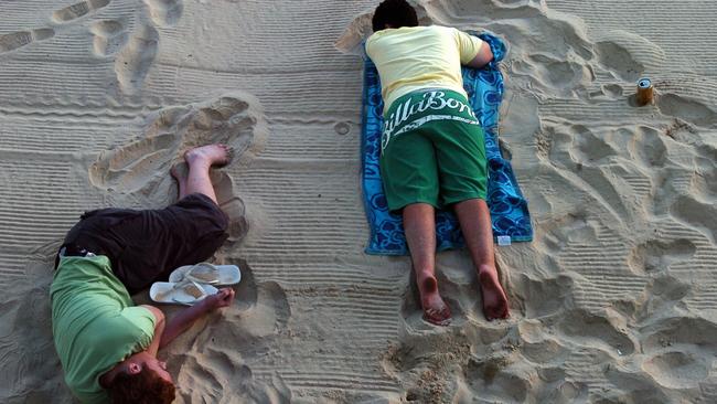 New Year’s Day at Mooloolaba Sleeping off the night before in 2006. Picture: Warren Lynam.