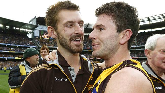 Brendan Whitecross (left) has missed two premierships because of his knee injury. Picture: Michael Klein