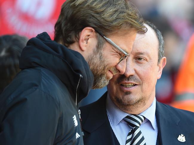 Liverpool manager Jurgen Klopp talks with Newcastle United boss Rafa Benitez.